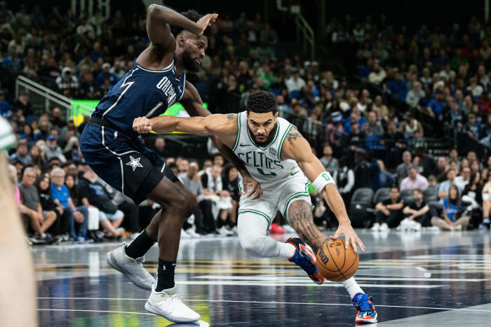 Orlando Magic forward Jonathan Isaac defending Boston Celtics star Jayson Tatum